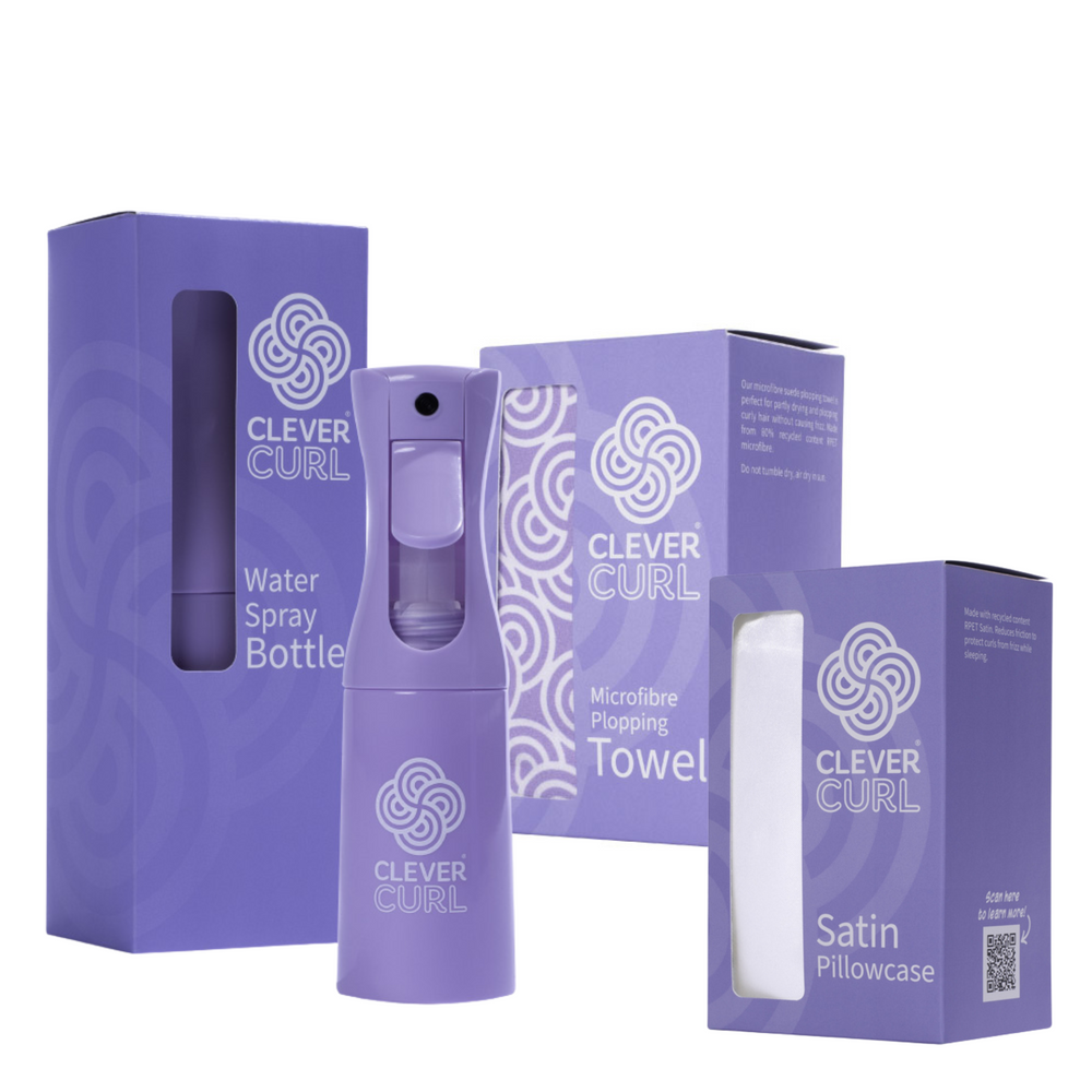 Clever Curl product set including a water spray bottle, microfibre padding towel, and satin pillowcase with packaging.