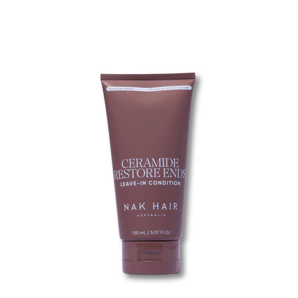 A tube of NAK HAIR Ceramide Restore Ends Leave-In Condition hair care product in a deep plum-brown color, shown on a plain white background.