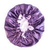 Purple satin sleeping bonnet on a white background